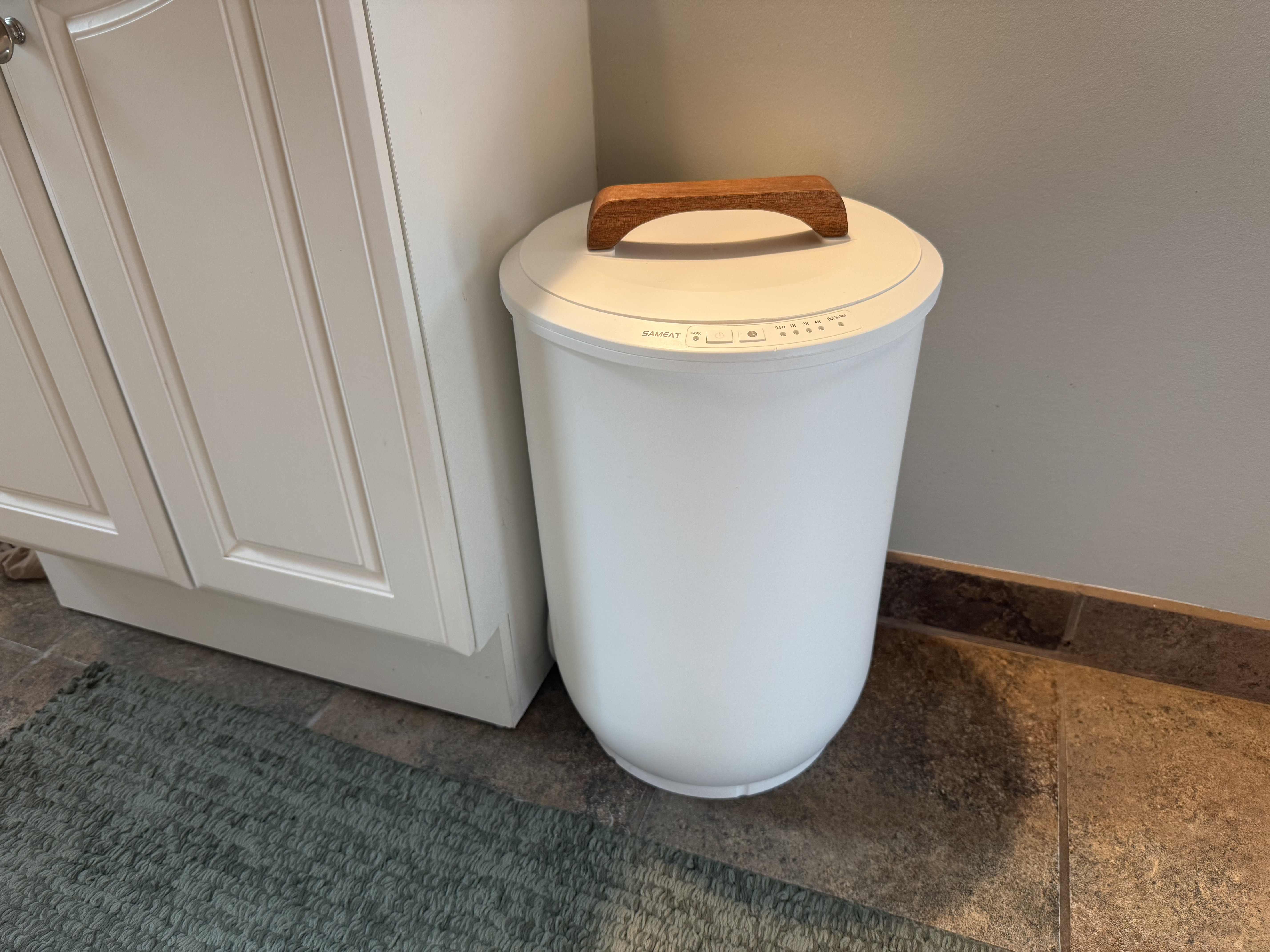 Heated towel warmer in a bathroom